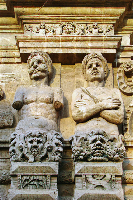 Atlantes, male equivelent of caryatids, depicting the Moors defeated by Charles V, Porta Nuova, Palermo PhotoJean-Pierre Dalbéra